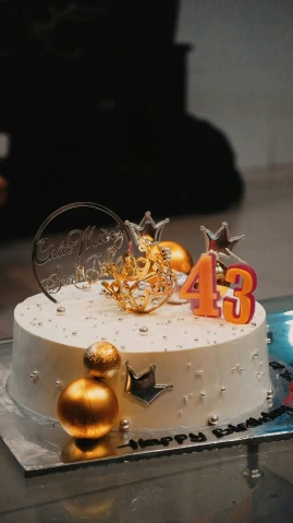 a cake with number forty and christmas decorations on it