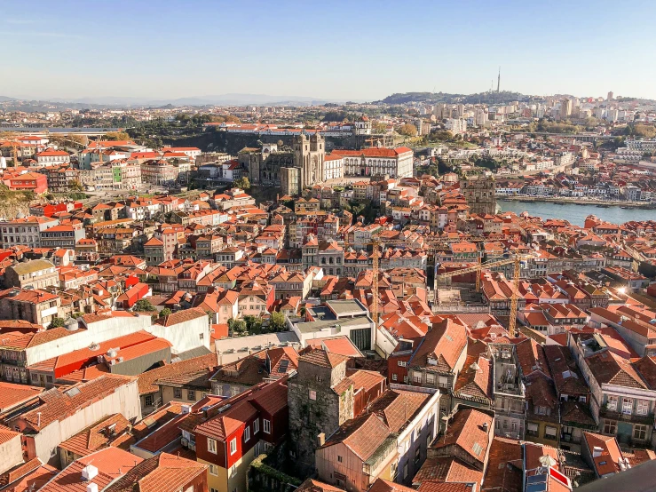 aerial po of old city with waterway and buildings