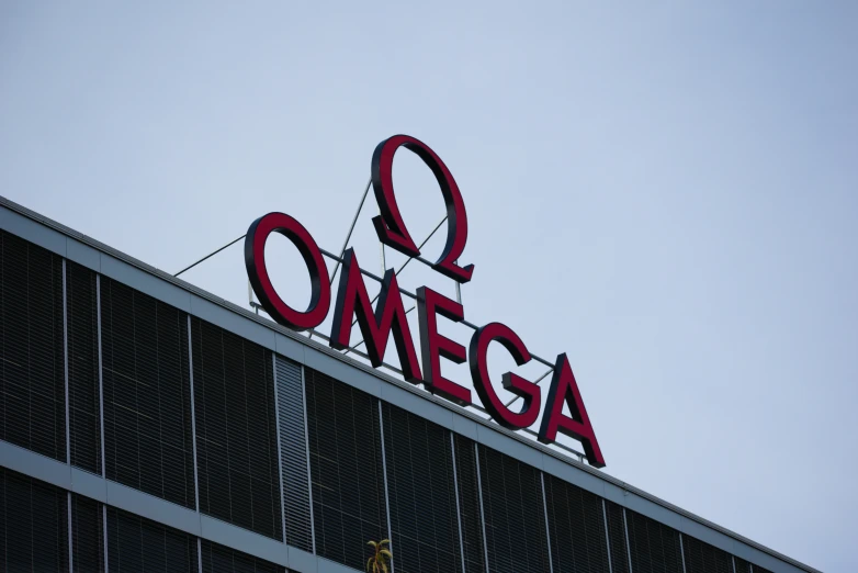 an onega sign that is on top of a building