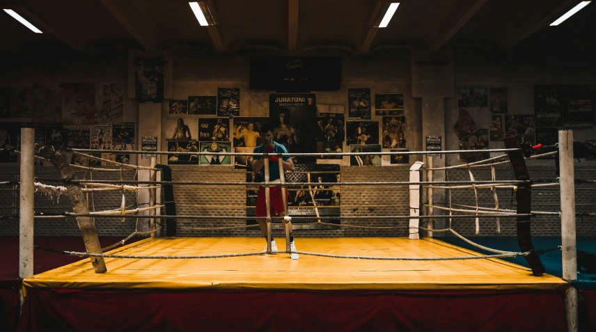 an empty boxing ring is kept open for a crowd