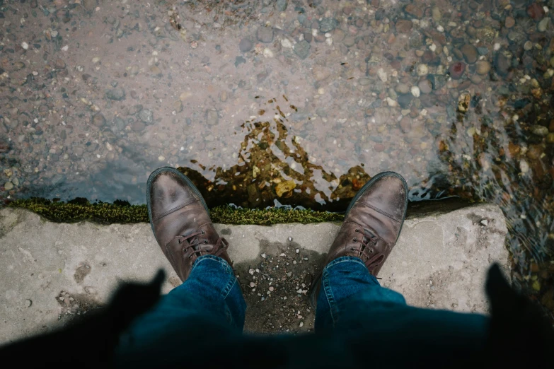 someone standing in the middle of a walkway