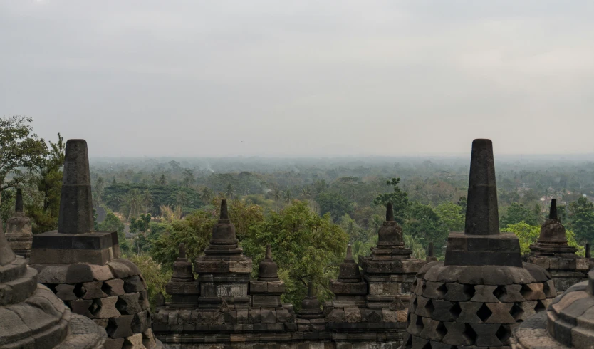 an outdoor temple set in a scenic area