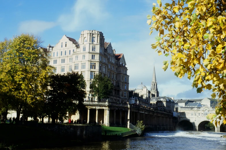 the old building is on one end of the lake