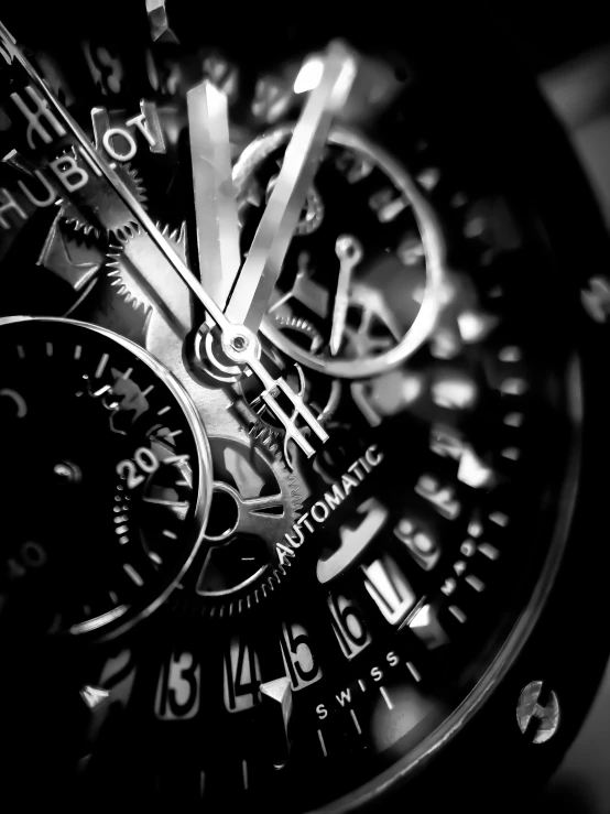 a close - up view of a mechanical watch's hands