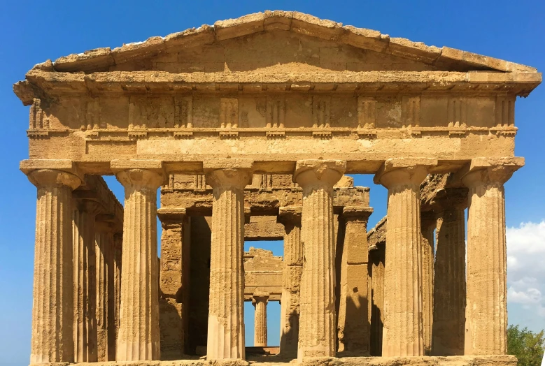 large stone structure in front of the sky