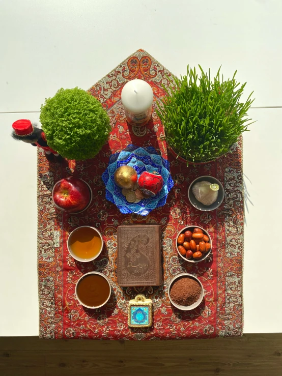 small garden displayed on table with assortment of food items