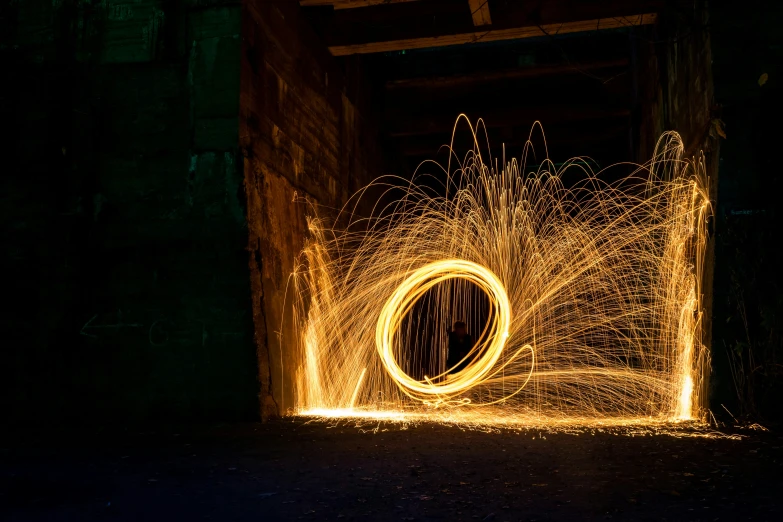sparklers flying through the air in a circular light