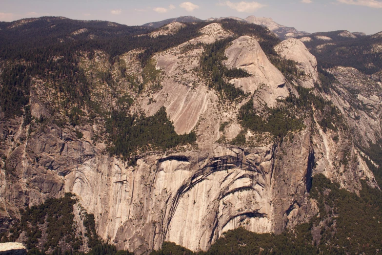 this is a view of a mountain side with the top of some mountains