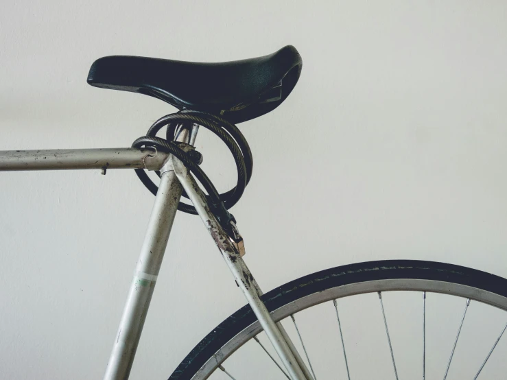 a close up of a bicycle with the seat down