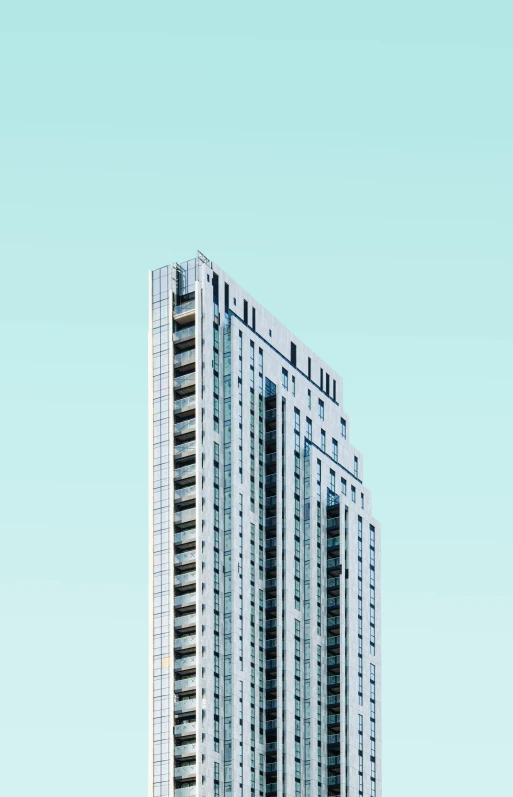 a tall building with a sky background