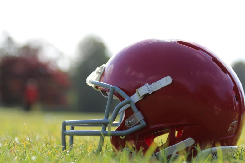 the helmet is red and silver, but has white stitchs on it