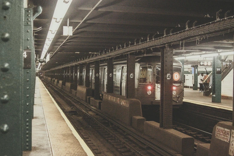 the train is pulling into the station platform