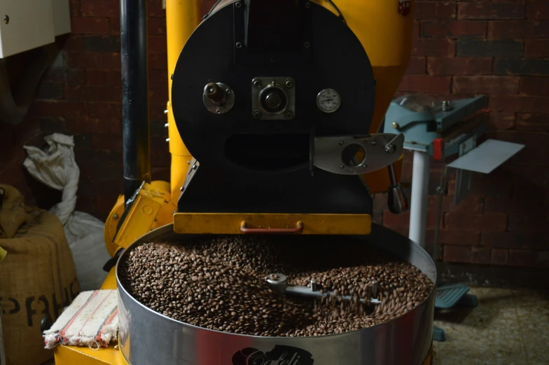 coffee is being stirred from an automated machine