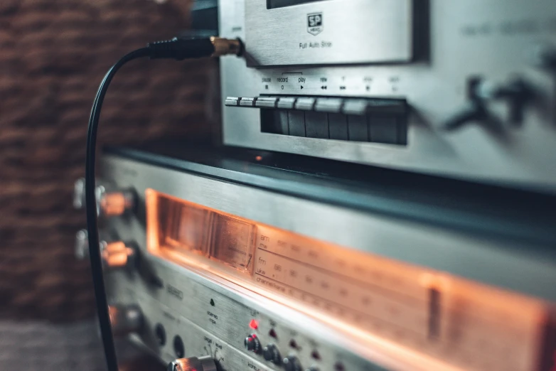 an old looking radio on display with other items