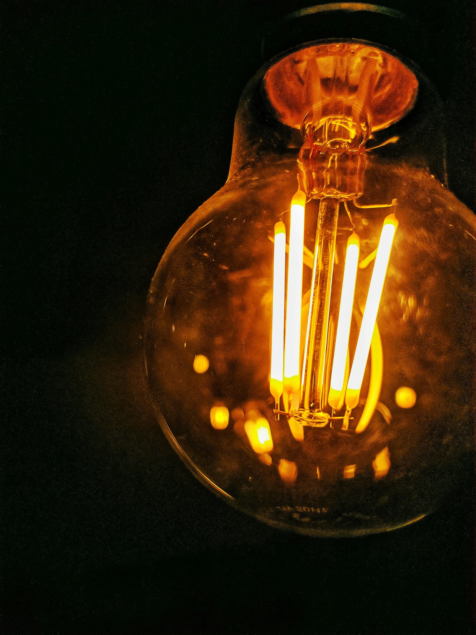 an image of a light bulb in dark room