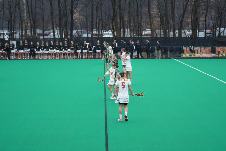 the field hockey team has a team of women playing