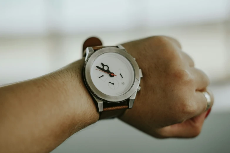 close up s of a person's wrist watch