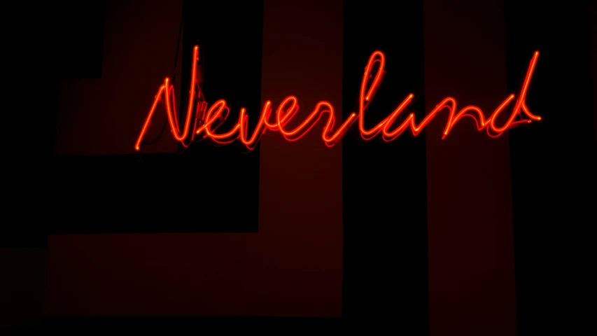 the neon sign says neverlands in red