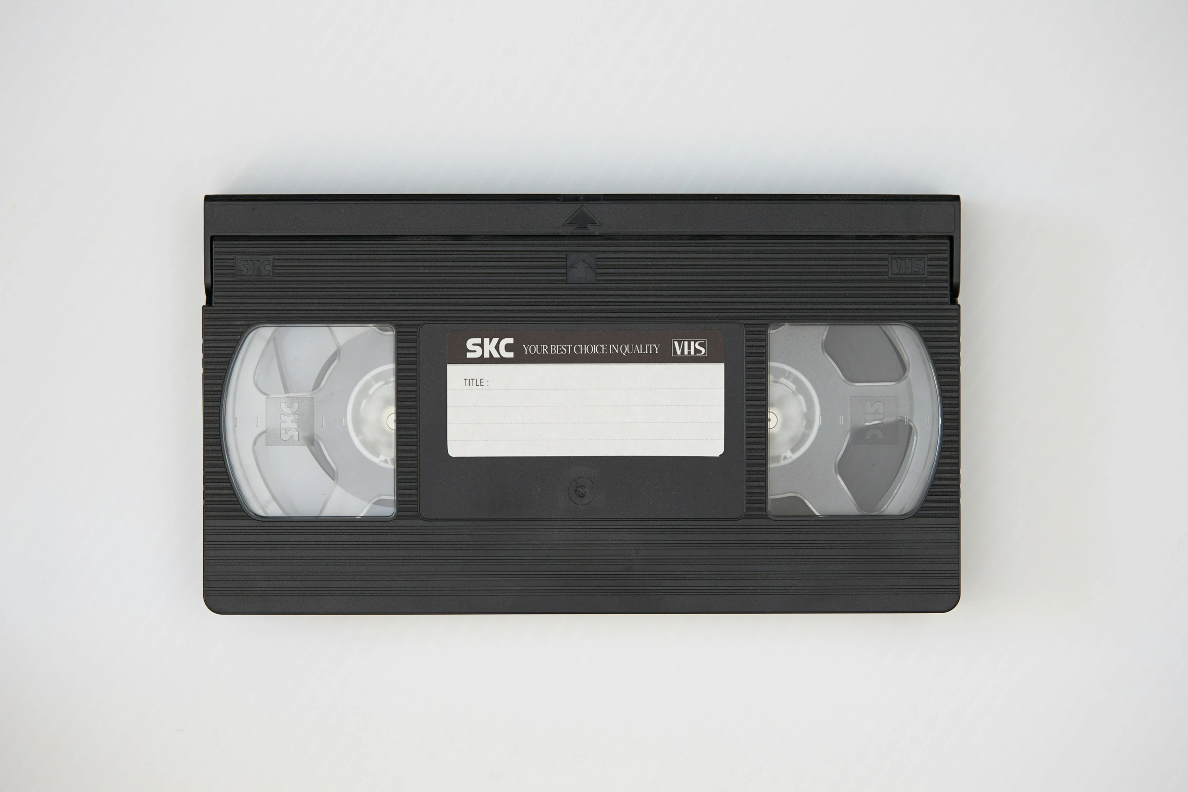 a black and white tape recorder sitting on a table