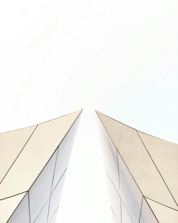 two white pyramids reaching into the sky