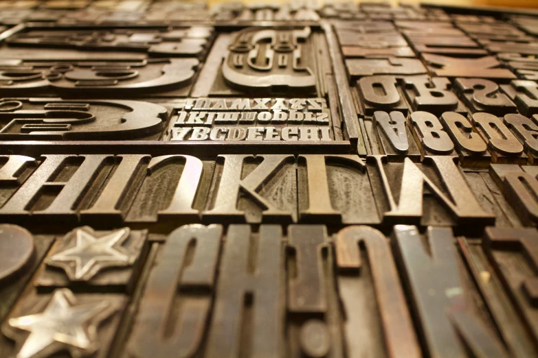 several wooden letters and numbers are in this close up image