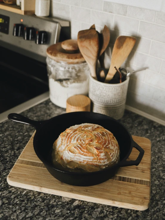 this is an image of some bread in a cast iron pan