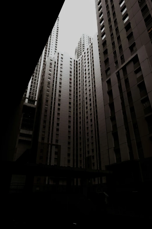 a tall building with many windows and a clock