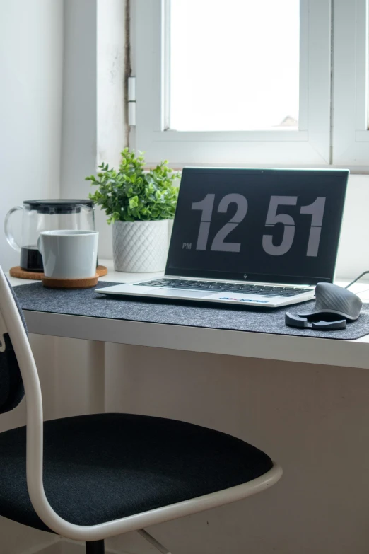 there is an office table with a desk and chair