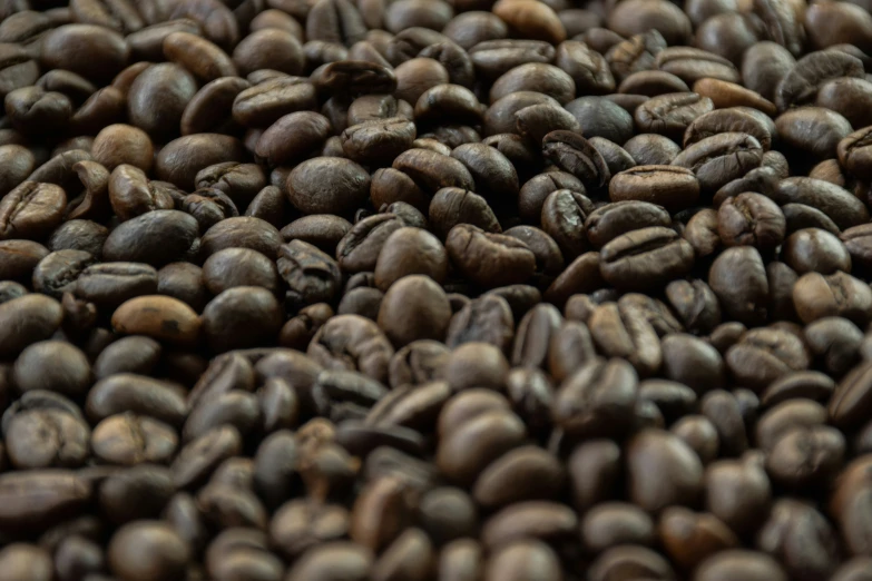 an image of a large pile of roasted coffee beans