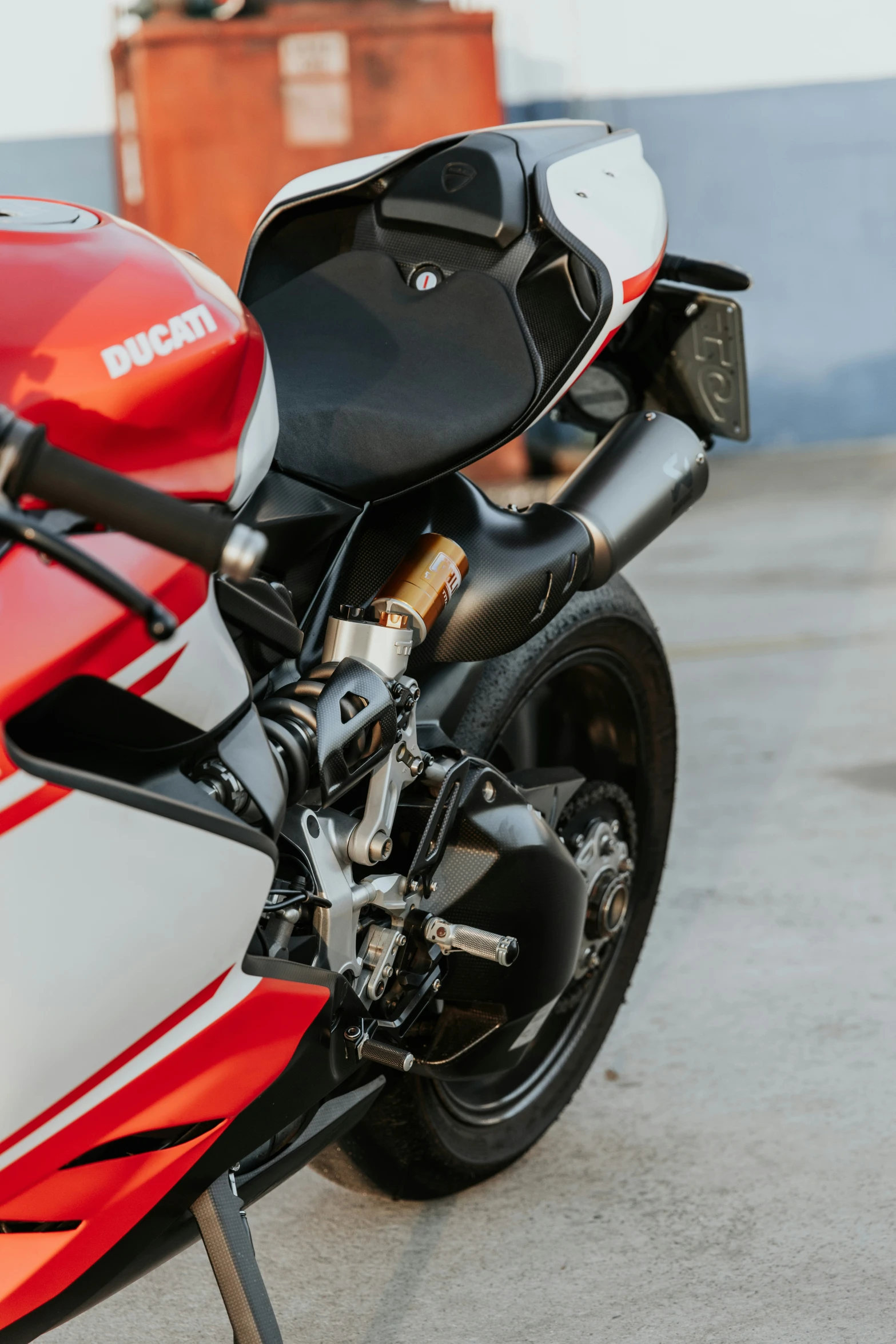 a parked motorcycle with two seats folded down