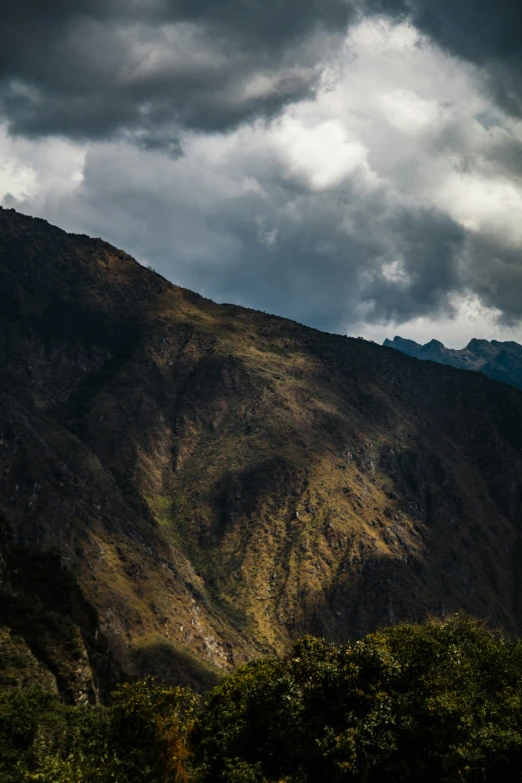 the hills and the trees are dark in the daytime