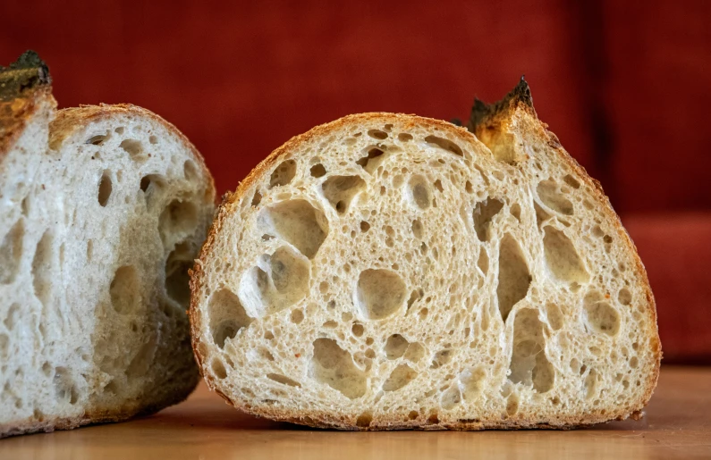 two slices of bread with holes cut into them