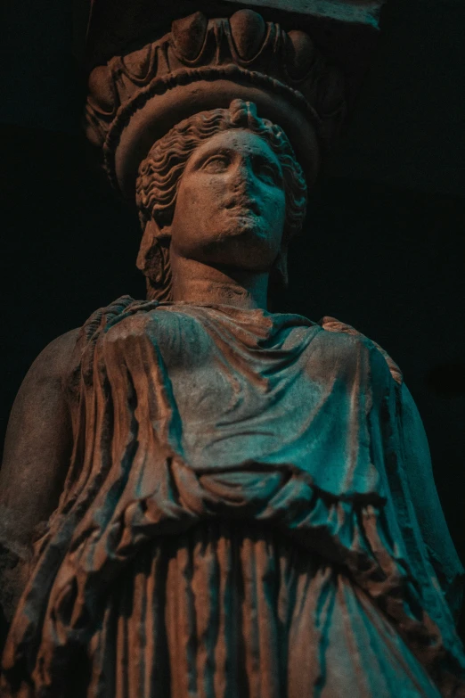 the face of the statue is illuminated in the dark