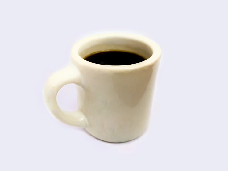 a large cup of coffee is sitting in front of a white background