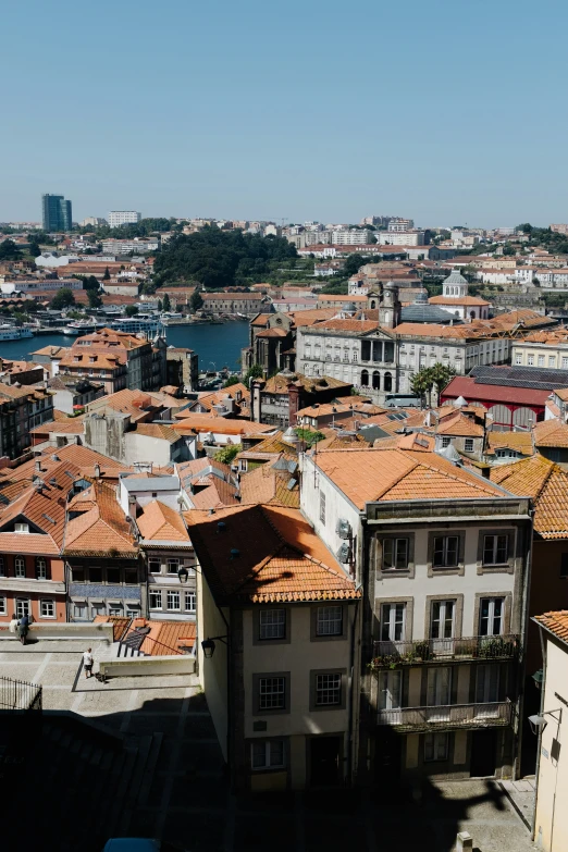 several buildings with some roofs covered in red tiles