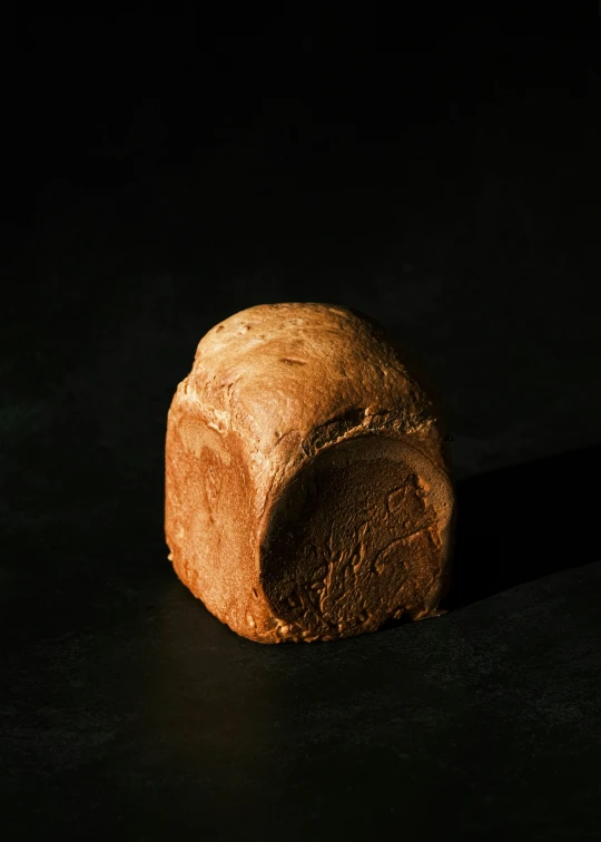 a piece of bread sitting on top of a counter