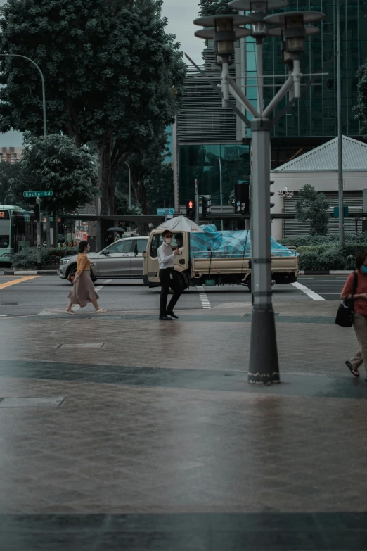 the city streets are wet by the rain