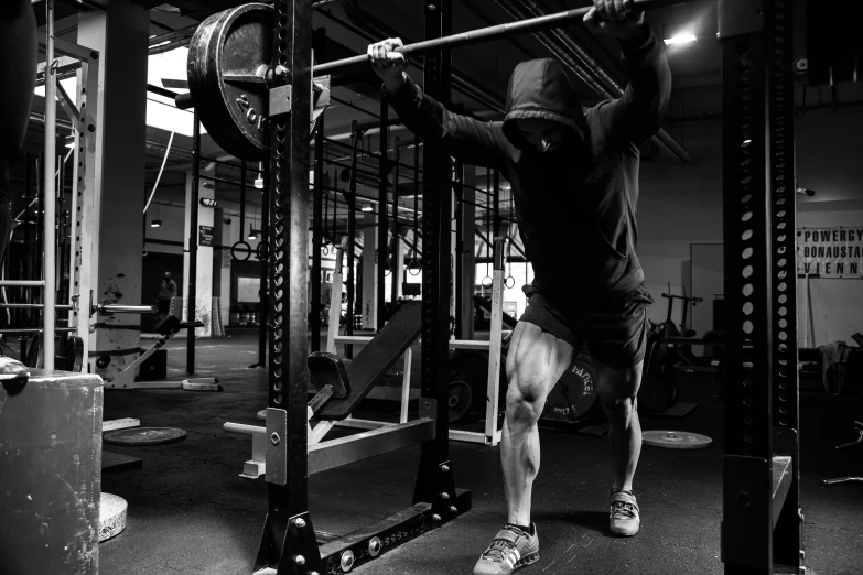 a man is doing some exercises on the gym equipment