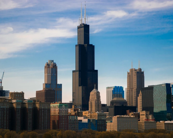 large skyscrs are rising over the city of chicago