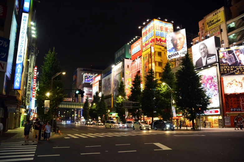 a street that has several different types of buildings and signs