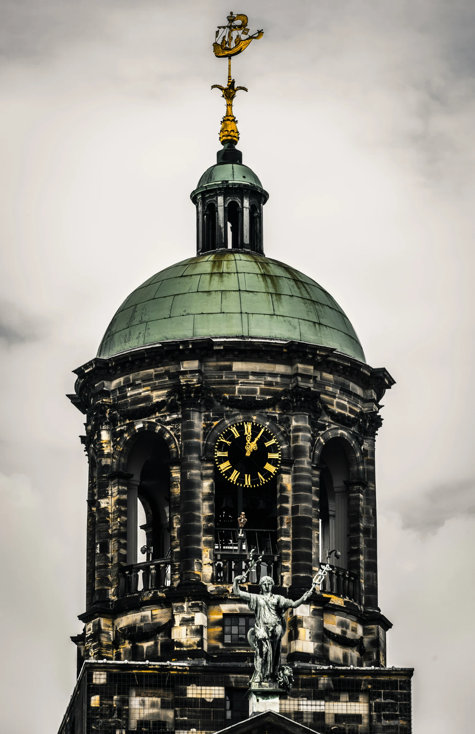 a large cathedral building with a clock on the top