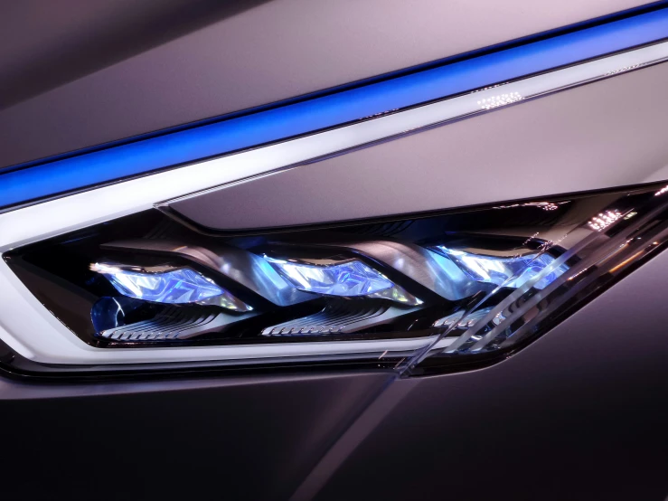 a close up s of the headlights on a car