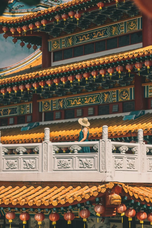 a balcony that is decorated in oriental style