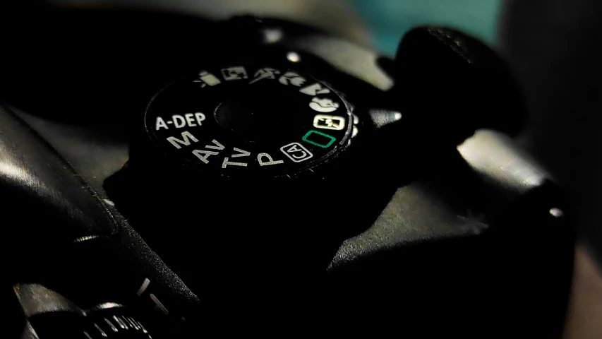 a close up of a digital camera's controls