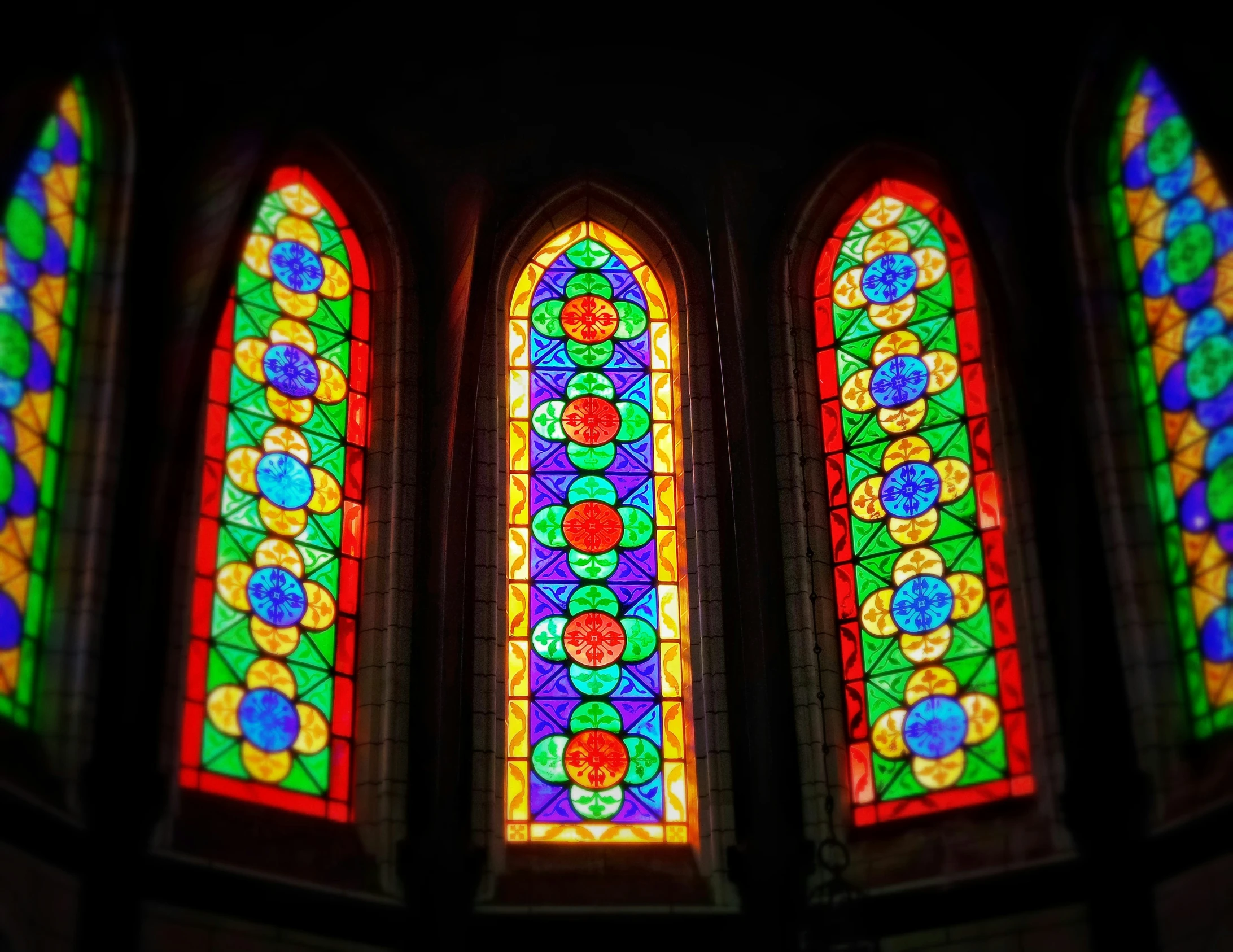 an image of stained glass windows in a church