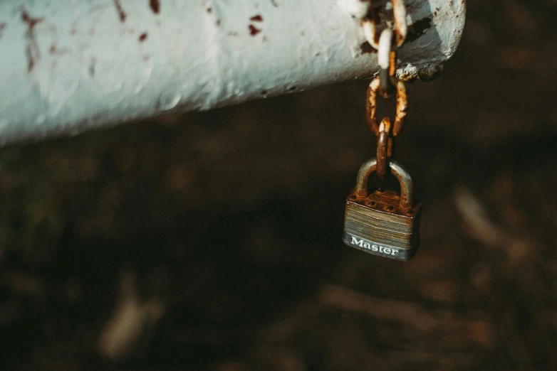 a chain with a lock and a padlock