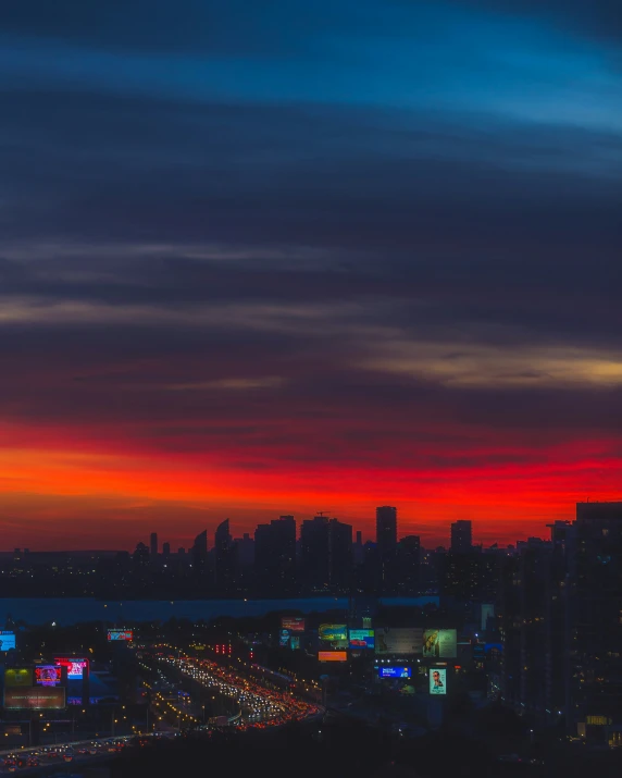 a beautiful sunset from a rooftop of an apartment building