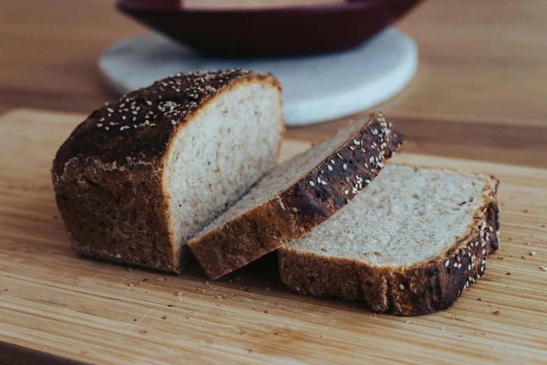 slices of bread and two bowls sitting on the table