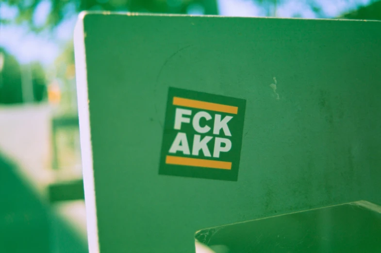 an image of a green sign that says fok akp