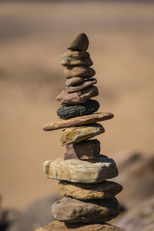 many rocks stacked together to form an oar shape